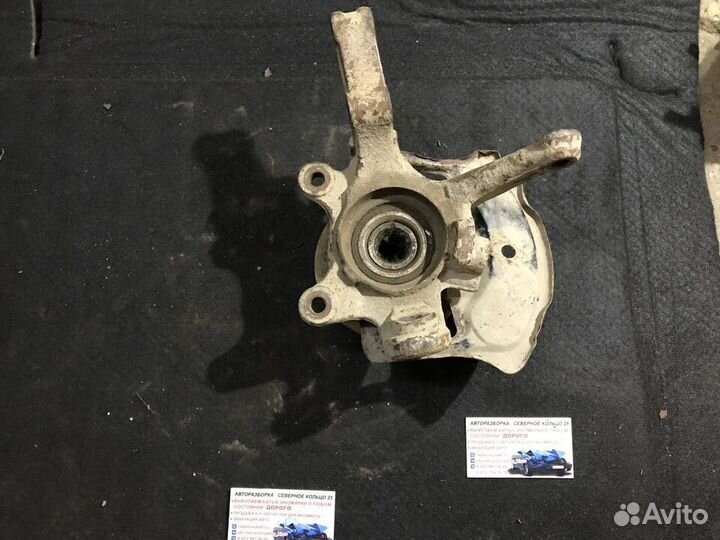 Кулак поворотный правый Ниссан Альмера Классик