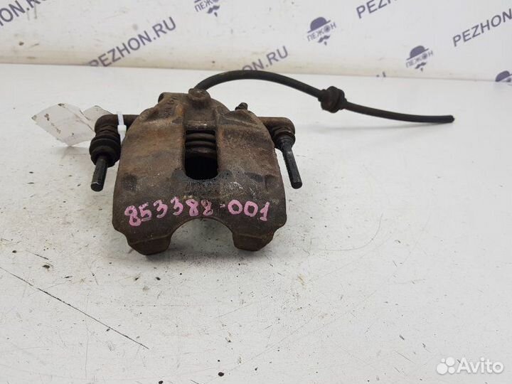 Суппорт тормозной передний левый Nissan Almera