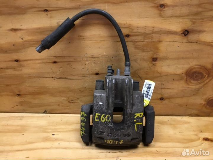 Суппорт лев. зад. BMW 525i