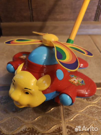 Игрушка каталка с ручкой Вертолет