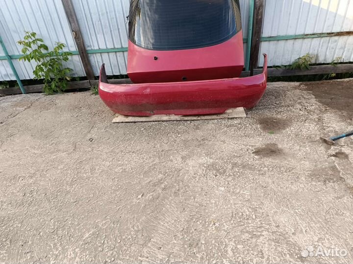 Бампер задний Мицубиси Каризма