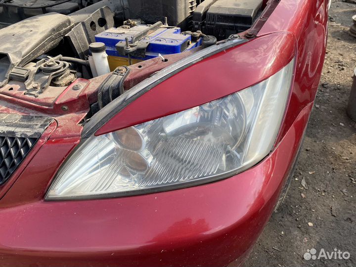 Фара левая MN161673 Mitsubishi Lancer 9 (CS) CS1A