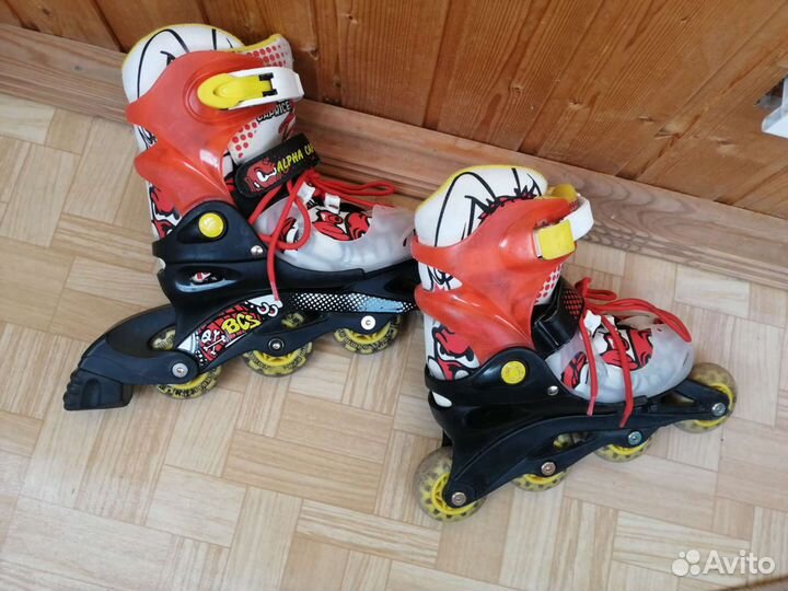 Роликовые коньки