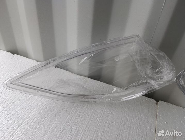 Стекло фары левое / правое Nissan Tiida 2008-2012
