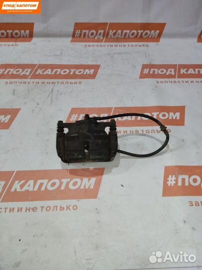 Суппорт тормозной передний левый Nissan X-Trail