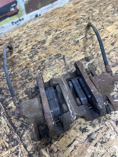 Суппорт задний Киа Спортейж 2