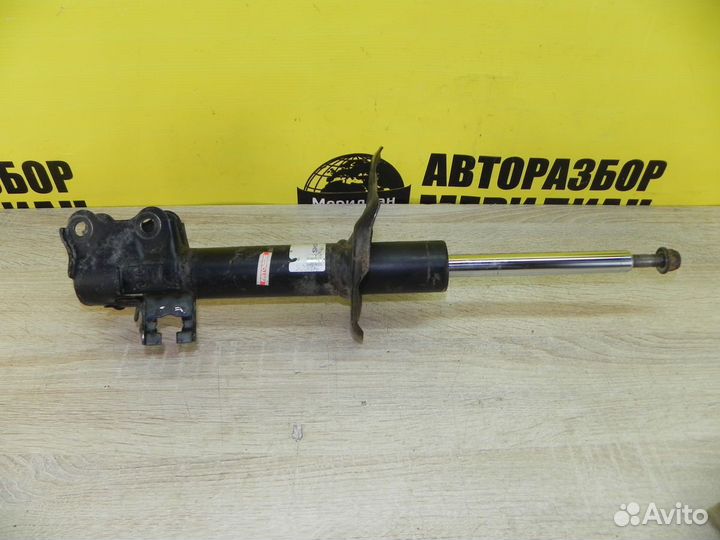 Nissan Almera N16 Амортизатор передний