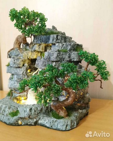 Скала с водопадом