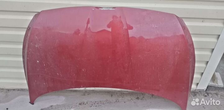 Капот от solaris оригинал чут вмятина есть