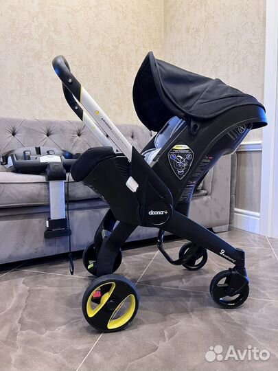 Коляска автокресло doona с базой isofix