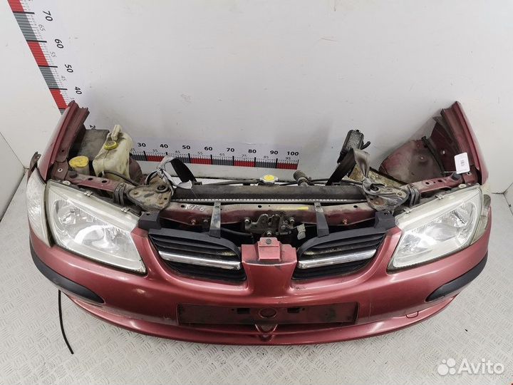 Бампер (ноускат) для Nissan Almera N16 R0B1F11K1V1