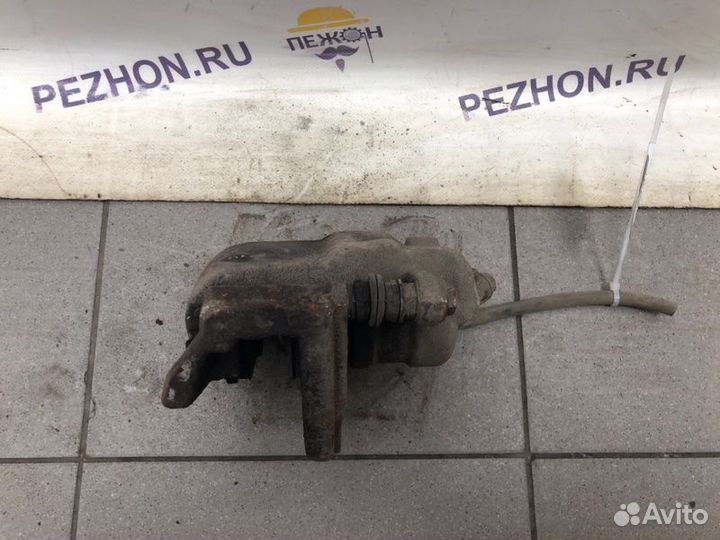 Суппорт тормозной передний правый Nissan Note