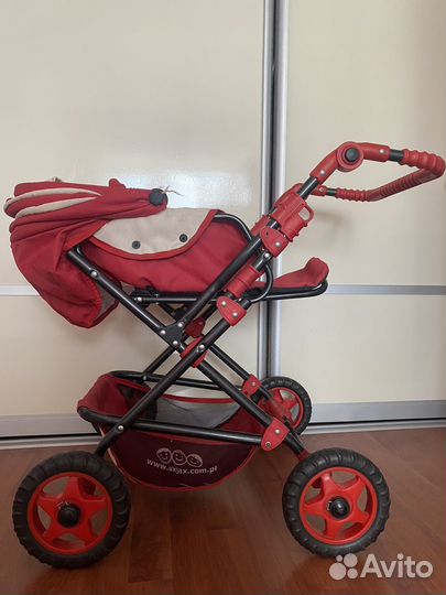 Игрушечная коляска для кукол