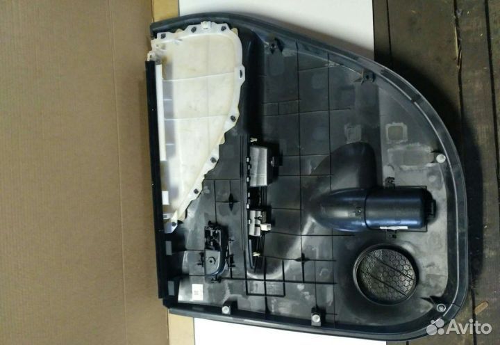 Обшивка двери задняя левая Toyota Ractis