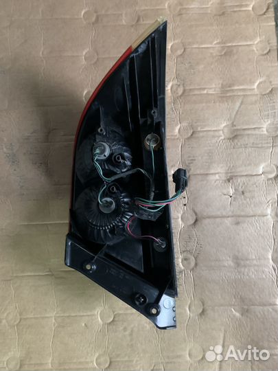 Левй фонарь mitsubishi lancer