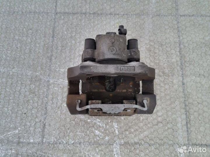 Суппорт тормозной задний левый Bmw X5 E70 N55B30