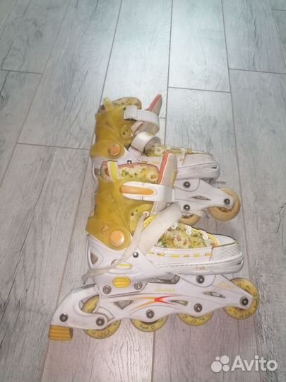 Роликовые коньки