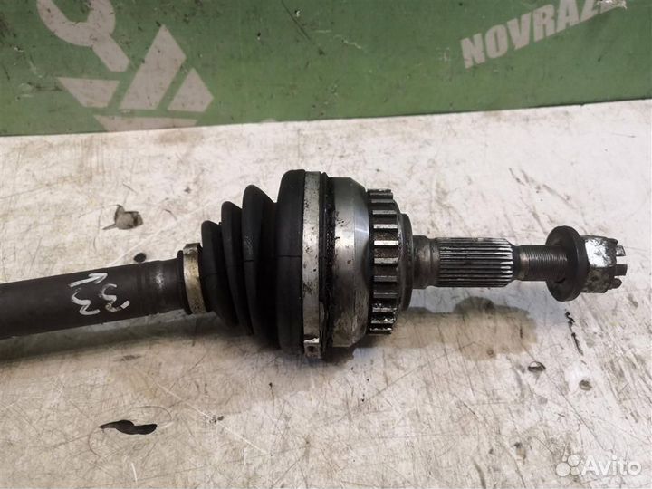Полуось передняя левая Опель Вектра А