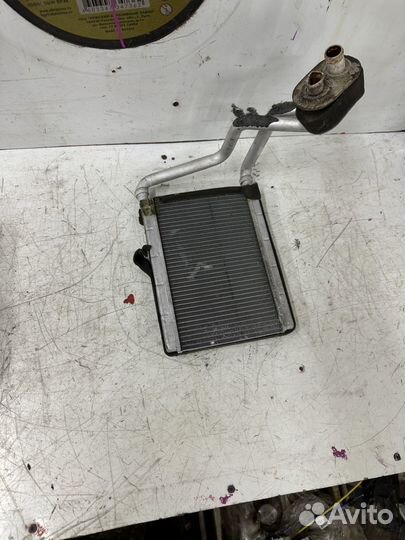 Радиатор отопителя печки Geely MK Cross
