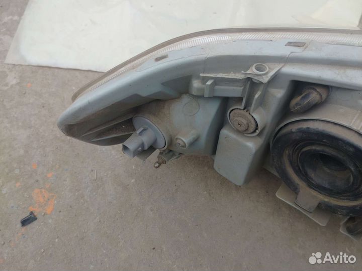 Фара левая Chevrolet Aveo T250