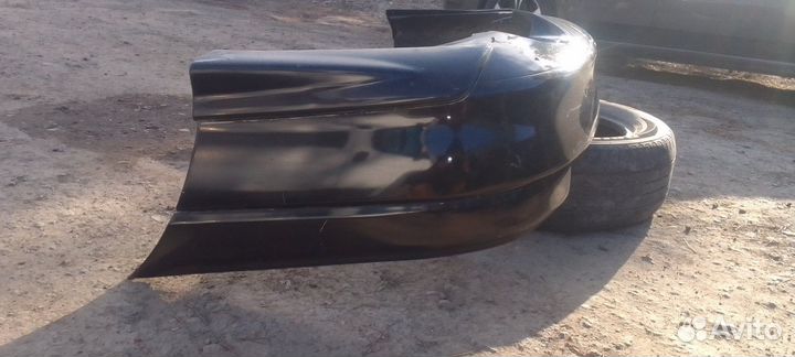 Задний бампер тайота Калдина