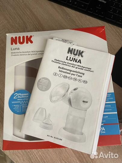 Молокоотсос электрический новый