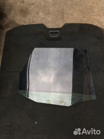 Стекло двери заднее левое Volvo V40