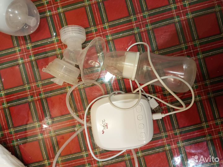 Электрический молокоотсос