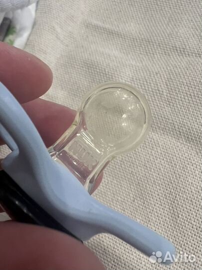 Книжка бортик,соска Nuk,термометр,бутылочка