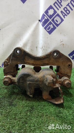 Суппорт передний правый Mitsubishi Pajero Sport