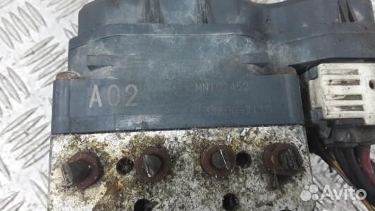 Блок ABS mitsubishi L200 K4T (HEA33KW01)