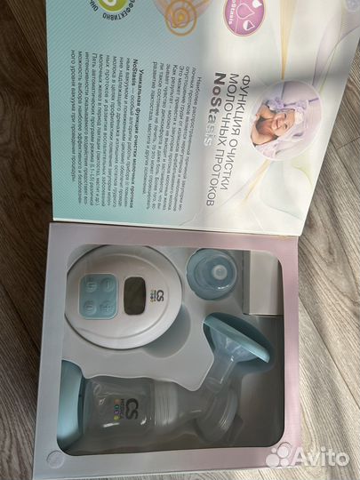 Молокоотсос электрический новый