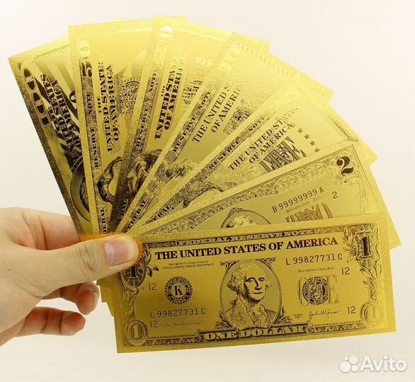 Золотые банкноты.Доллары США