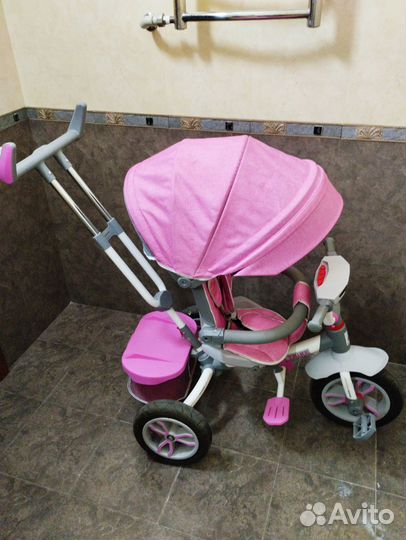 Трехколесный велосипед с родительской ручкой