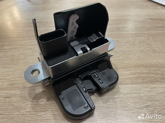 Замок багажника