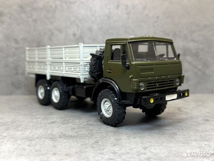 Модель грузовика камаз 4310 борт хаки 1:43