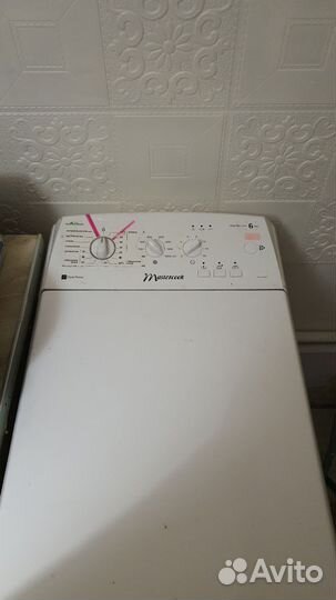 Стиральная машина с вертикальной загрузкой