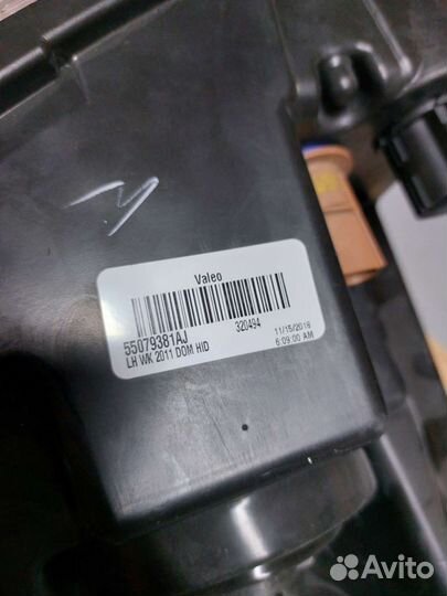 Фара левая Jeep Grand Cherokee WK2 новая оригинал