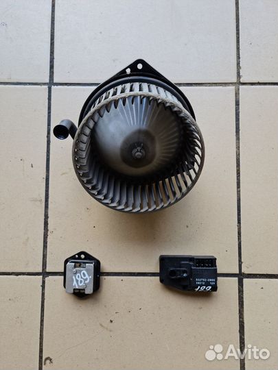 Моторчик отопителя Mitsubishi Lancer IX