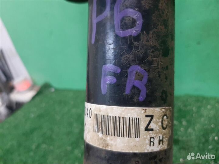 Стойка амортизатора передняя правая Subaru Imprez