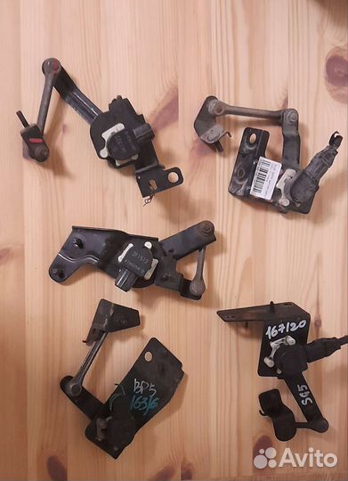 Датчик наклона корректора фар Субару