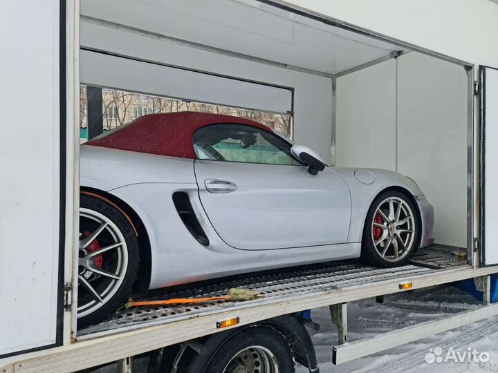 Крытый эвакуатор автовоз