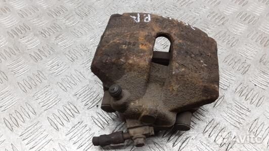 Суппорт тормозной передний правый volkswagen passa