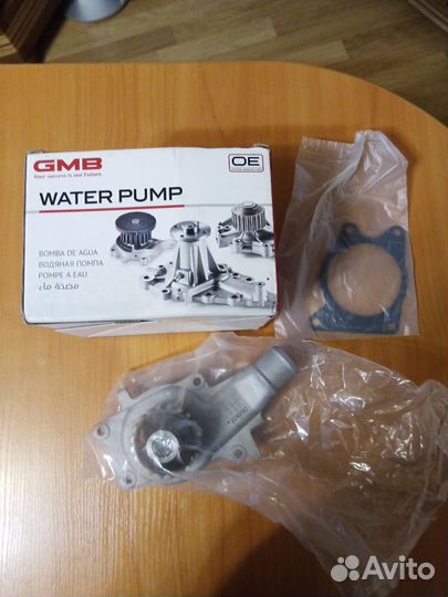 Водяной насос в сборе (помпа) ford escort v