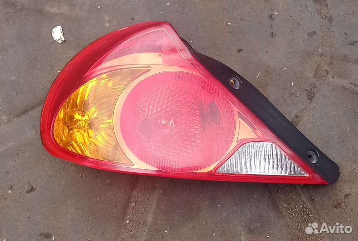 Фонарь задний левый на Kia Spectra