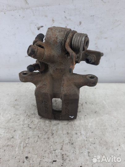 Суппорт тормозной задний левый Honda Civic хэтчбэк