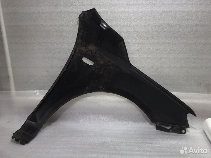 Крыло левое Kia Cerato (09-12г) поворотник