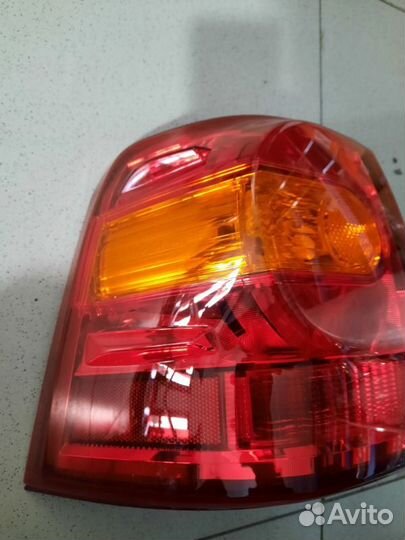 Фонарь наружный задний левый Тoyota Land Cruiser