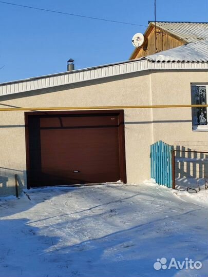 Автоматические и механические секционные ворота