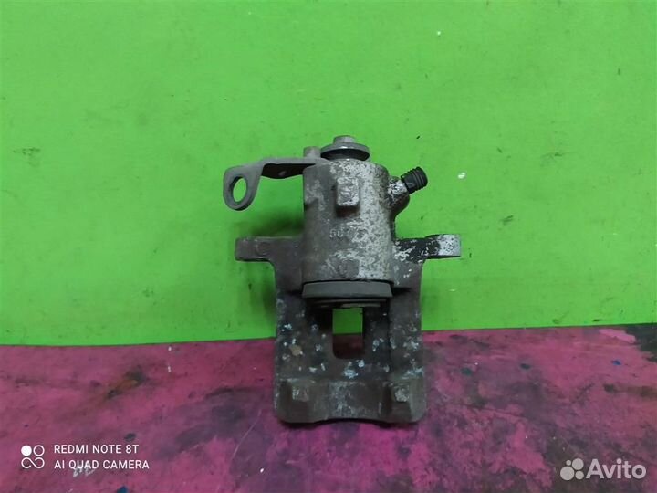 Суппорт задний левый Fabia 2 Polo Rapid 6R0615423